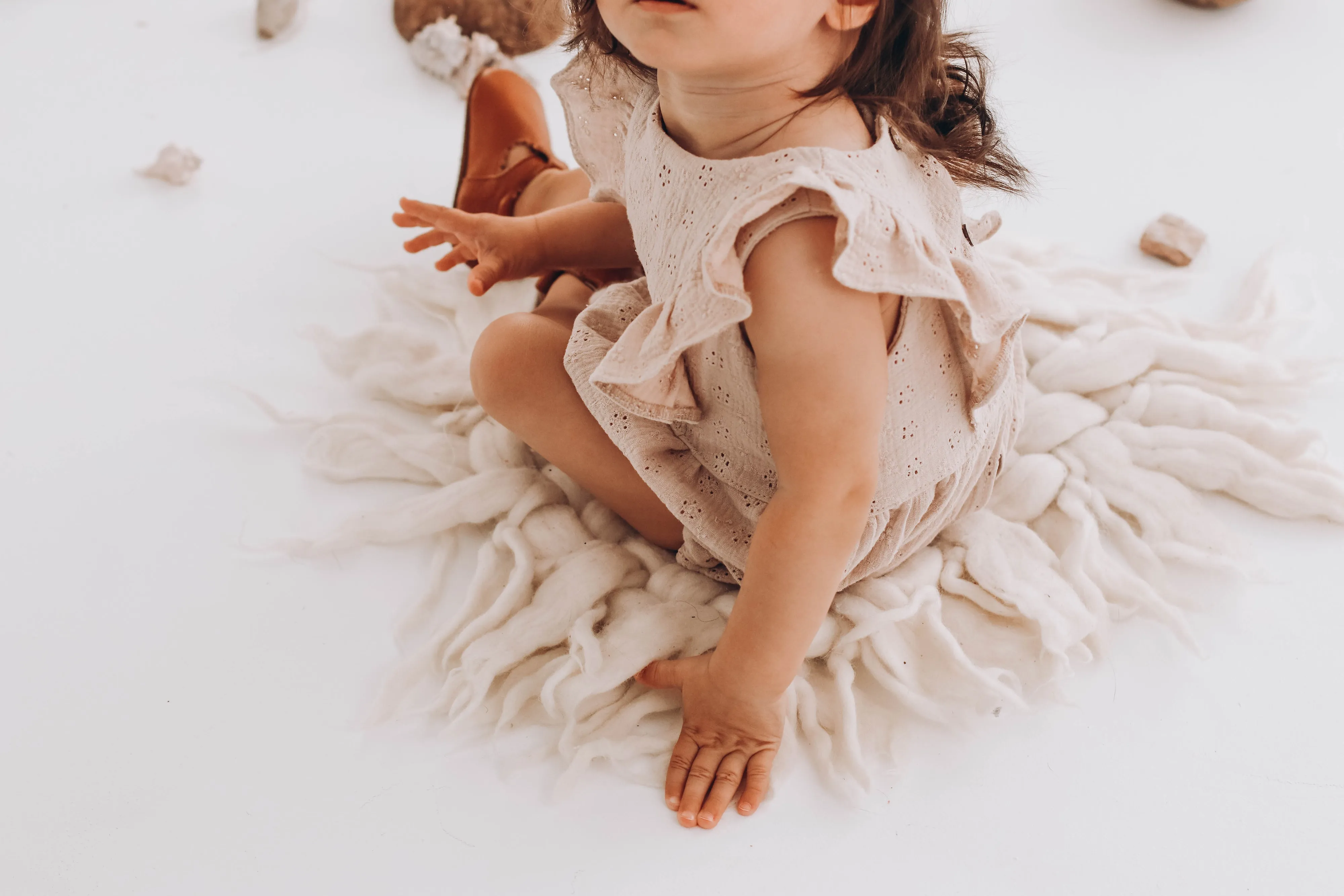 Embroidered muslin romper with frills