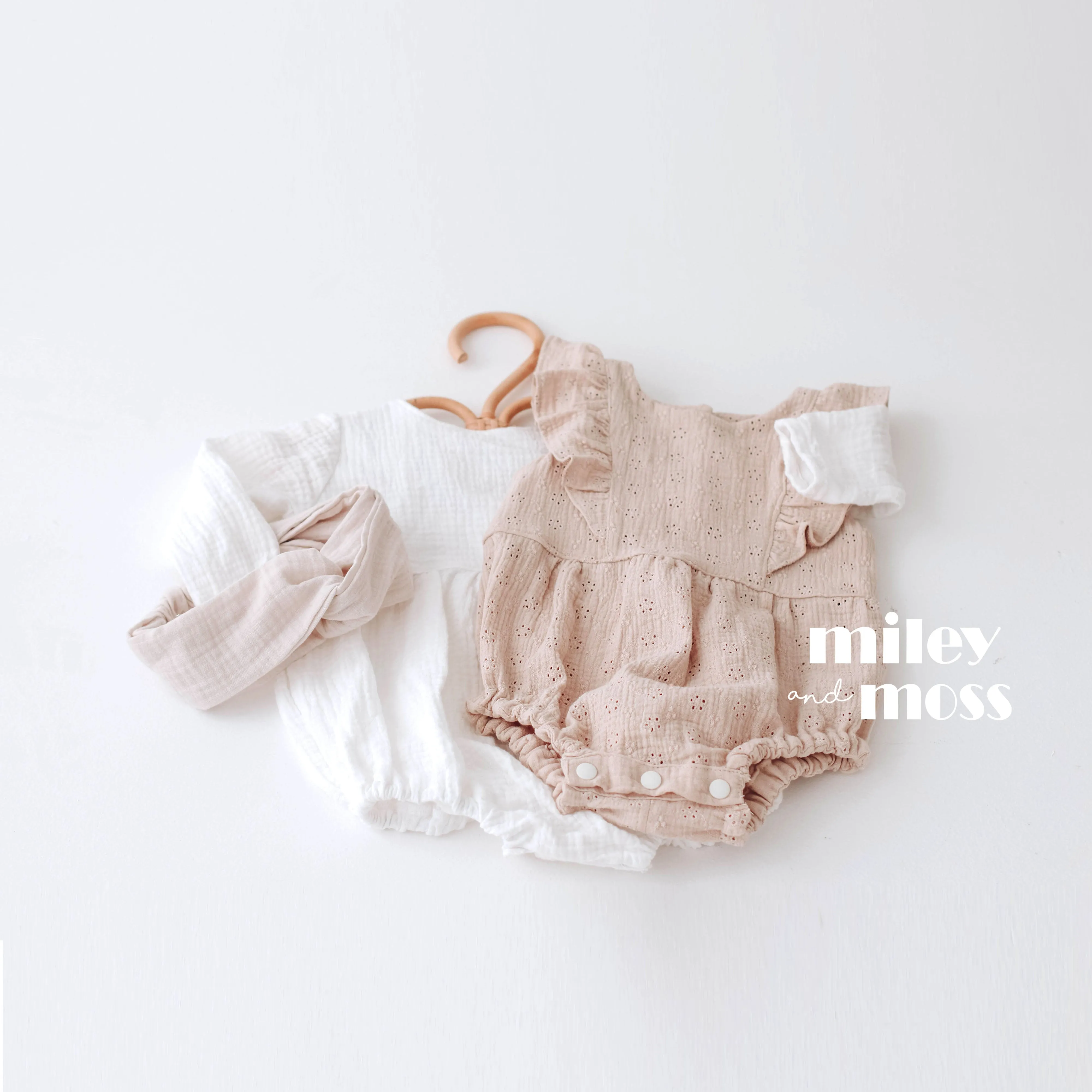 Embroidered muslin romper with frills