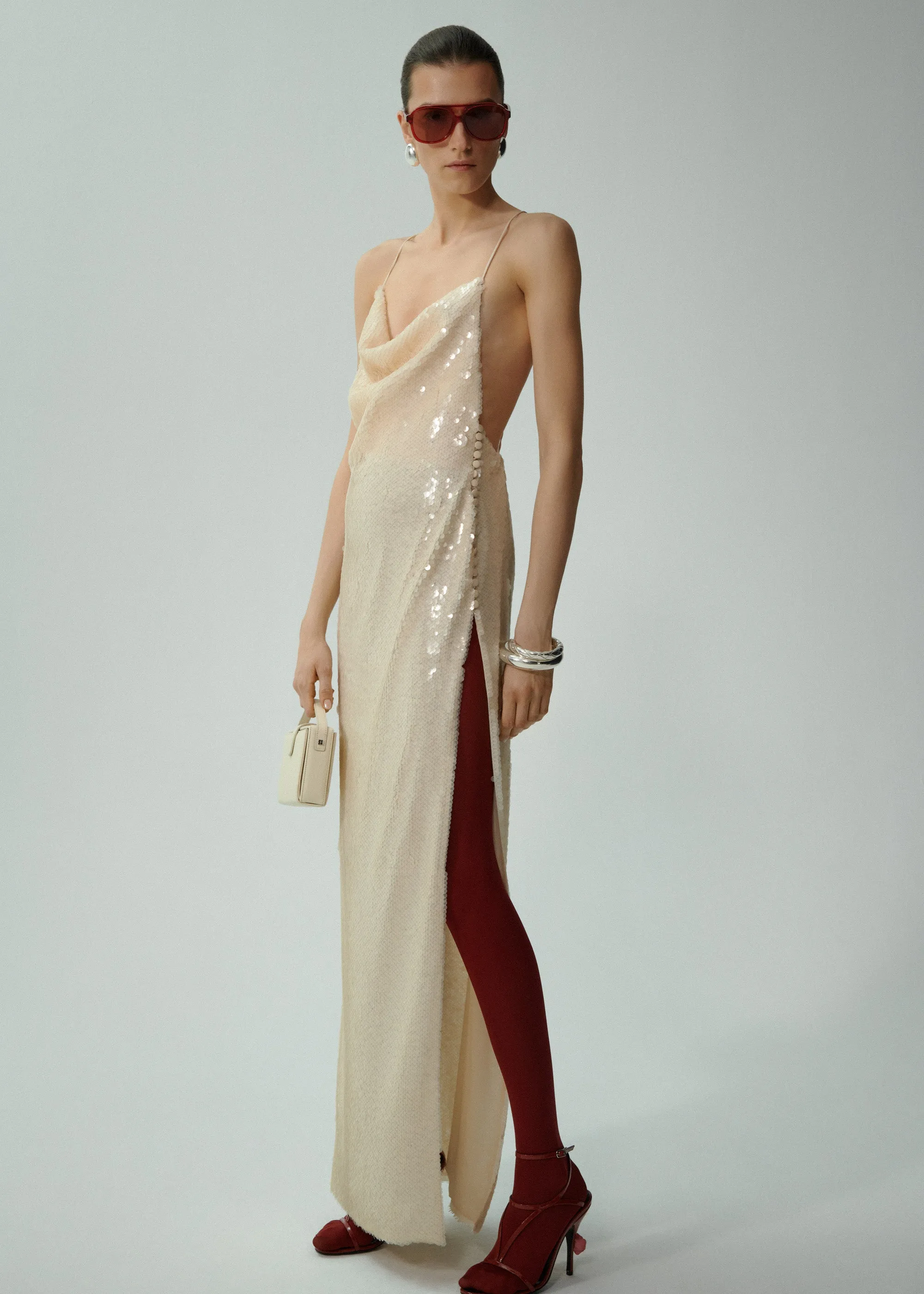 Sequin spaghetti strap gown in cream